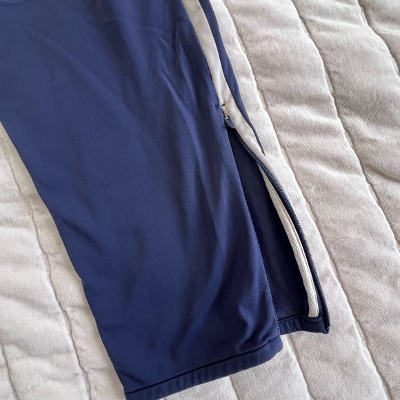 Tracksmith Turnover Track Pants with Off White Side Stripe, zip ankles. Size SM - Picture 4 of 11